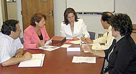 Officers of the new Association for Latino Faculty and Staff meet at the Puerto Rican/Latin American Cultural center. 