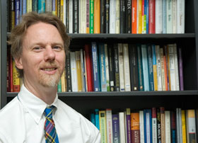 Tom Roby, associate professor of mathematics, is the new director of the Q Center.