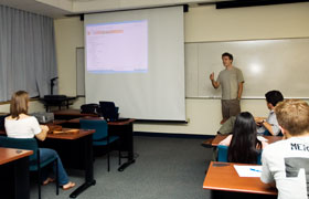 Christian Zimmerman, associate professor of economics, teaches an FYE class on Nobel Prize-winners.