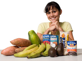 Chandra Osborn, a graduate student in psychology, displays some of the items she included in food charts and meal plans to help Latino diabetics in Hartford.