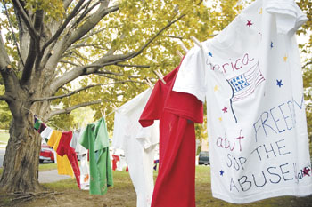 T-shirts hanging outside the Women's Center are part of the Clothesline Project, a worldwide movement to promote awareness of domestic violence.