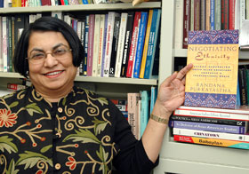 Bandana Purkayastha, associate professor of sociology, with her new book Negotiating Ethnicity in her office at Manchester Hall.