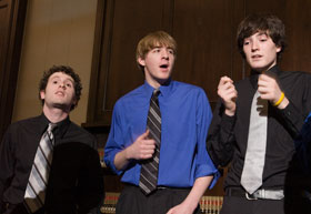 Members of the Conn-Men a cappella group perform the Alma Mater in the North Reading Room at Wilbur Cross Building as part of the 125th Anniversary kick-off celebration.