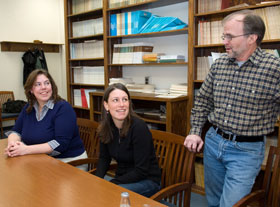 Forensic archaeologist James Chatters, right, speaks with anthropology graduate students Kristen Bastis, left, and Christine Newkirk about his study of the 9,400-year-old Kennewick Man, one of the oldest human skeletons unearthed in North America.