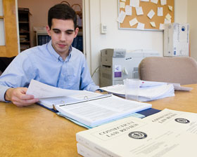 Joel Norwood, a second-year law student, at the office of the Connecticut Law Review.