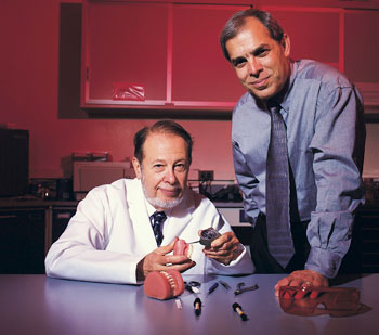 Charles Burstone, seated, professor emeritus of orthodontics, and Jon Goldberg, professor of oral rehabilitation, biomaterials, and skeletal development, invented FibreKor, a material used in dental bridges and crowns. The product was named one of 25 innovations that changed the world.