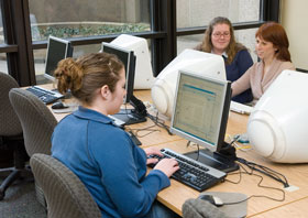 Students and faculty use the computer education center at the Lyman Maynard Stowe Library, one of the support services in the Health Center's new Department of Health Informatics.