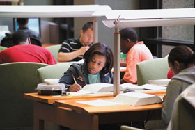 Students studying at the Health Center library.