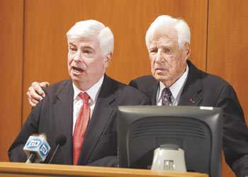 Whitney Harris, right, a former prosecutor at the Nuremberg Trials, and Sen. Christopher Dodd. Harris spoke at the Dodd Center on the 60th anniversary of the judgment at Nuremberg.