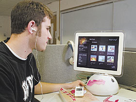Maxwell Gigle, a sophomore majoring in political science and international relations, uses a podcast and a computer learning program as part of his study of the Arabic language.