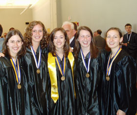 Lara Batey, Julie Monteagudo, Hillary O’Donnell, Kira Sullivan-Wiley, and Erin Twohig celebrate after the Honors Medals Ceremony April 29.