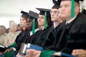 Students at the Health Center listen to a Commencement address by Dr. Francis Collins, director of the National Human Genome Research Institute.