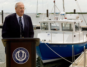 Former Gov. Lowell Weicker, left, speaks during the dedication of a new marine sciences research vessel named in his honor at the Avery Point Campus.