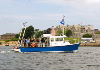 The University's newest research vessel, the R/V Weicker passes by the Avery Point campus on Long Island Sound shortly after its dedication. 
