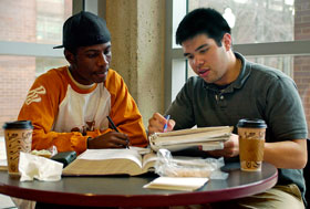 Students study for an exam at the Bookworms Cafe in Homer Babbidge Library.
