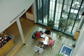 Students study for an exam  in a foyer of the Chemistry Building.