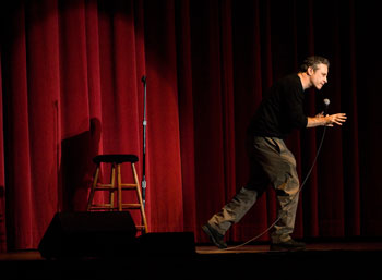 Television personality Jon Stewart, host of the satirical Daily Show, on stage at the Jorgensen Center for the Performing Arts during Family Weekend. Stewart's two sold-out shows were part of the University's 125th Anniversary celebrations.