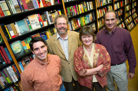 From left, psychology professors Peter Snyder, David Kenny, Mary Crawford, and John Dovidio, at the UConn Co-op. Each has a new book being published, and the Co-op arranged a group signing for them.