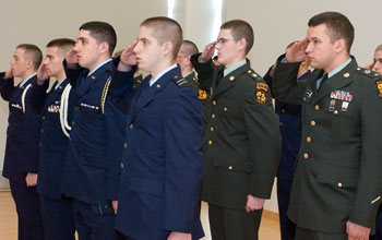 Members of the Army and Air Force ROTC at UConn salute during the Veterans Day ceremony on Nov. 9 in the Student Union Ballroom