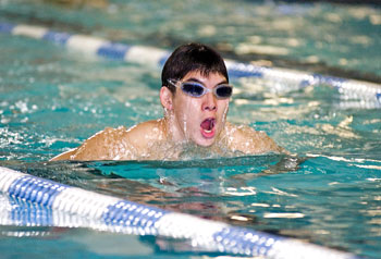 Go Kamiyama, a junior majoring in management information systems, swims laps in Brundage Pool, in the Student Recreation Facility.