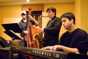 Mike Knowles, bass, Tom Wise, sax, and Dan Campolieta, play jazz at Lu's Caf. Fine arts jazz students perform each Thursday evening at 9 in the Family Studies Building caf.