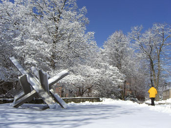 A wintry scene outside the Benton Museum. The sculpture is by Larry Mohr.