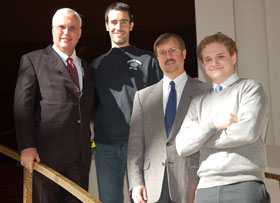 From left, David Woods, dean of fine arts, and UConn alumni John Froelich, Keith Narkon, and Dan Jeanette, who were hired at the Metropolitan Opera in New York after graduating. 