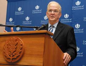 Newly appointed President Michael J. Hogan answers questions during a press conference at Rome Ballroom.