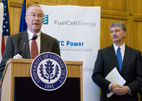 Provost Peter J. Nicholls speaks during a Sept. 18 press conference at the state Capitol announcing funding for alternative energy research. At right is Sen. Donald Williams, Senate President Pro Tempore.