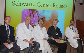 From left, Dr. Joseph Civetta, Dr. Peter Deckers, Nancy Baccaro, Elizabeth Taylor-Huey, and Dr. Upendra Hegde lead a Schwartz Rounds discussion with care-givers at the Health Center.
