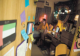 A student in her room in Global House, a new living/learning community in McMahon Residence Hall.