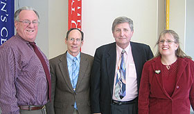 The 2007 Close to Home volunteer committee, from left: M. Kevin Fahey, senior associate director of student activities; Stuart Sidney, professor of mathematics; William Stwalley, Board of Trustees Distinguished Professor of Physics; and Kathe Gable, alumni and community relations coordinator, School of Nursing.