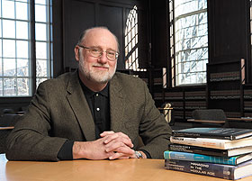 Richard Langlois, professor of economics, is interested in how corporations evolve. 