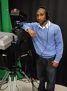 Brandon Cardwell, a senior with an individualized major in mass media, popular culture, and entrepreneurship, at the campus TV studio.