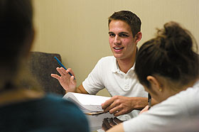Jeffrey Ticehurst, a junior who transferred to UConn from Loyola College in Maryland, leads a meeting of Tau Sigma, the transfer student honor society. 