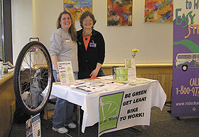 Joyce Fritz, left, and Connie Cantor staff a Bike to Work booth during the Health, Safety and Environment Fair at the Health Center March 28.