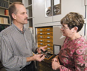David Wagner, professor of ecology and evolutionary biology, speaks with Jane O’Donnell, scientific collection manager, in the Collections Facility.