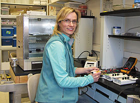 Ulrike Klueh, assistant professor of surgery, in her lab at the Health Center.