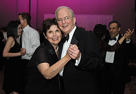 President Michael J. Hogan and his wife Virginia dance during the Student Gala at Rome Ballroom on Saturday evening.