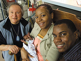 Toya and Joe Nash of Prairieville, La., with their son, Ethan Joseph, who was born prematurely. At left is Irene Engel, left, facilitator of the Health Center Auxiliary.