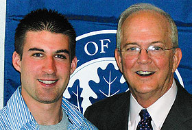 When President Michael J. Hogan came to UConn last fall, he discovered that his name was already taken as an e-mail address. That’s because three students shared his name. Since graduation, just one other Michael Hogan is left on campus, a sophomore majoring in finance. The two are pictured here at Gulley Hall.