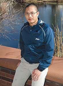 Graduate student Jie Hou, an immigrant from China, is putting his degree on hold to serve in the Air Force. 