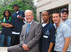 President Michael J. Hogan, center, meets with students (in dark blue shirts), participating in the Summer Law Institute outside the Legislative Office Building in Hartford. At right are law students Ken Kukish and Aaron Dubois. 