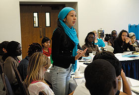 Aida Darzhanova, a student from Kazakhstan, speaks during a session of the intergenerational leadership forum sponsored by the UNESCO Chair in Comparative Human Rights.