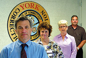 From left, clinical director Steven Lazrove, nursing supervisors Dianne Carter and Jane Hall, and administrator Ron Labonte, at York Correctional Institution.