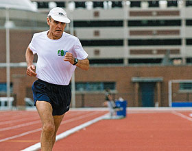 English professor David Sonstroem trains on the track at the Sherman Family Sports Complex. He will run in the Hartford Marathon on Oct. 11.