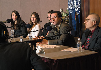 Panelists from left, Lauren Ellis, president of the College Democrats, Jennifer Miller, president of the College Republicans, and Professors Jeffrey Ladewig, Samuel Best, and Howard Reiter, all of political science, discuss the presidential race during a symposium at Konover Auditorium on Oct. 20.