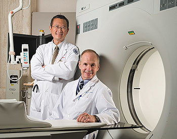 Dr. Bruce Liang, left, director of the Pat and Jim Calhoun Cardiology Center, and Dr. Douglas Fellows, chair of the Department of Diagnostic Imaging and Therapeutics at the Health Center.