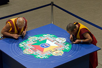 Tibetan Buddhist monks from Namgyal Monastery Institute of Buddhist Studies in Ithaca, N.Y., create a sand mandala in the William Benton Museum. After its completion Nov. 9, the mandala will remain on display until Dec. 7.