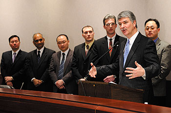 State Senate President Donald Williams, second from right, speaks during a press conference about the Eminent Faculty Program. From left are Mun Choi, dean of engineering, and Professors Prabhakar Singh, Tianfeng Lu, William Mustain, George Rossetti Jr., and Hanchen Huang.
